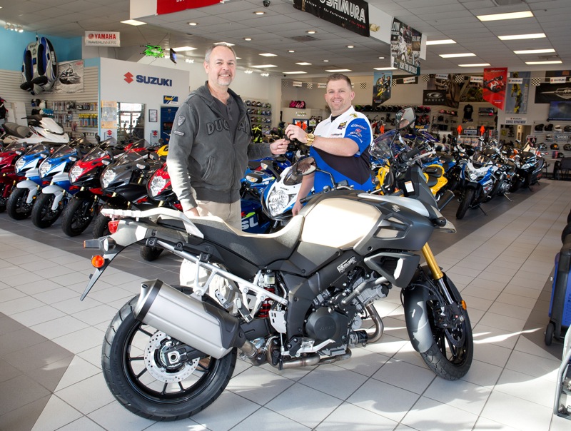 Kenneth Maves takes the keys to an all-new Suzuki V-Strom 1000 ABS Adventure motorcycle at Deland Motorsports, presented by Robert Stacey.